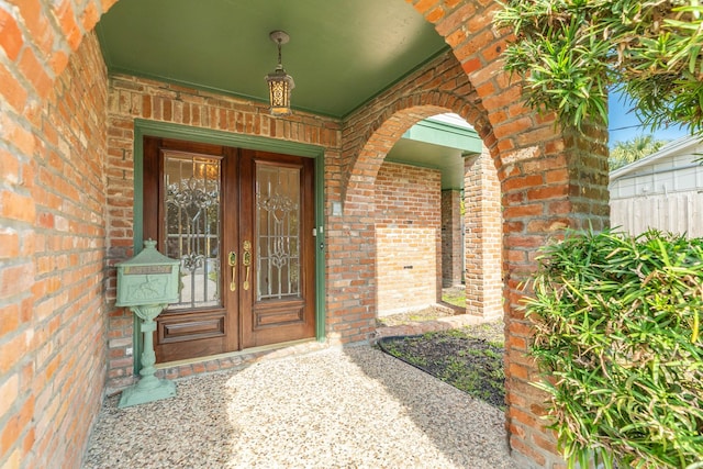 2610 Gerol Ct, Galveston, TX 77551 - property entrance featuring brick siding and french doors