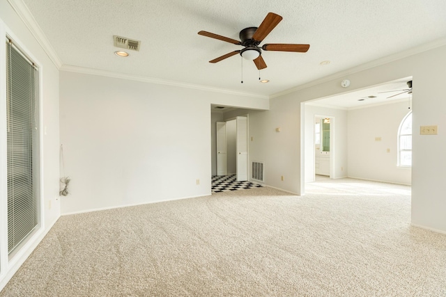 2610 Gerol Ct, Galveston, TX 77551 - unfurnished room with carpet floors, a ceiling fan, and visible vents