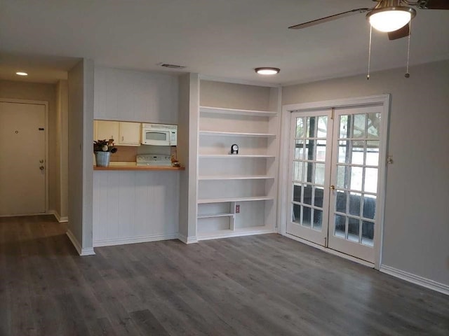 10555 Turtlewood Ct Unit 607, Houston, TX 77072 - unfurnished living room featuring french doors, dark wood-style floors, baseboards, visible vents, and a ceiling fan