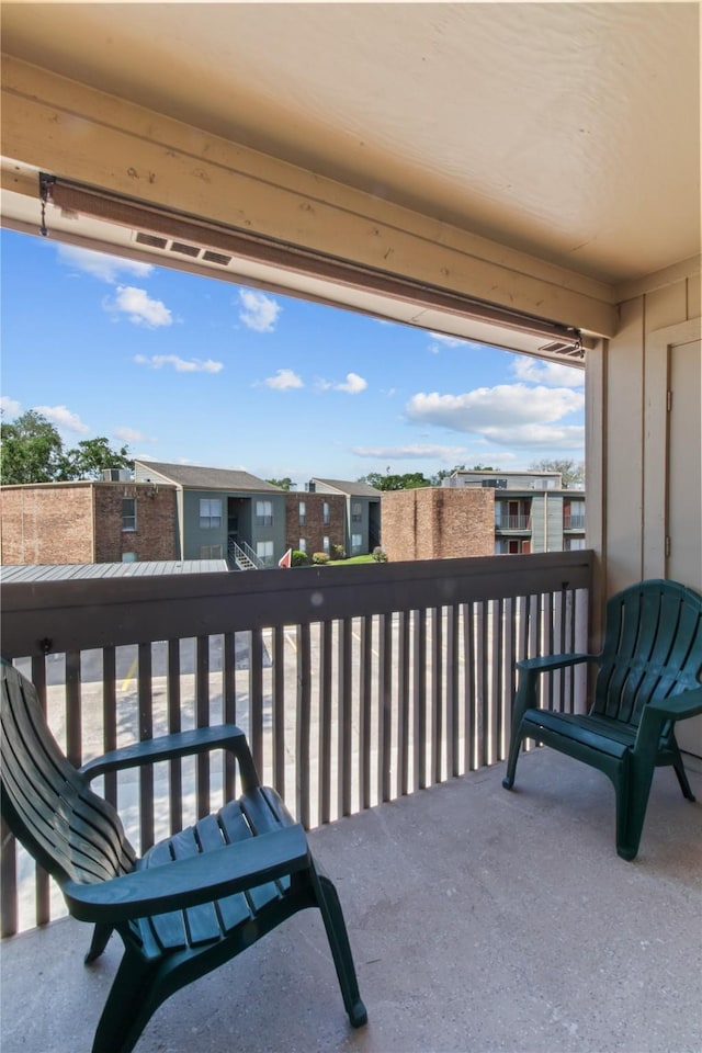 balcony featuring a residential view