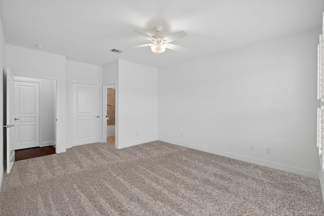 2939 Persimmon Grv, Richmond, TX 77469 - unfurnished bedroom featuring carpet floors, baseboards, and ceiling fan