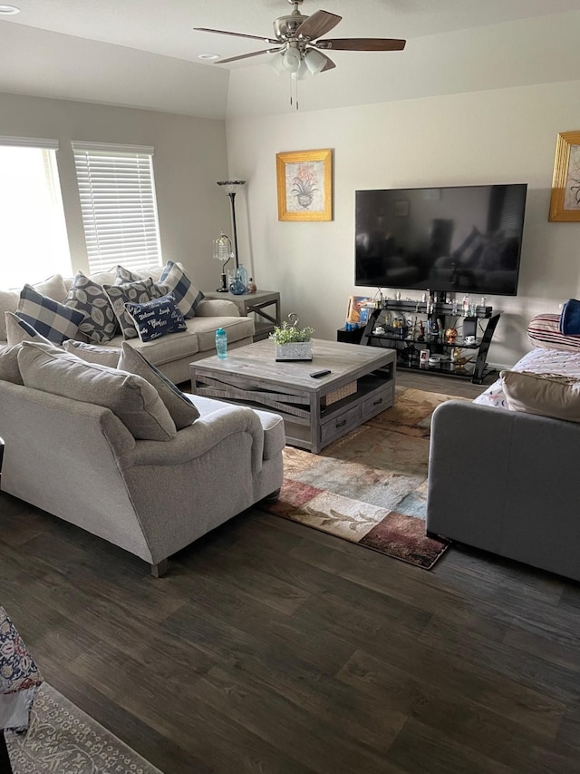 living area featuring wood finished floors and ceiling fan