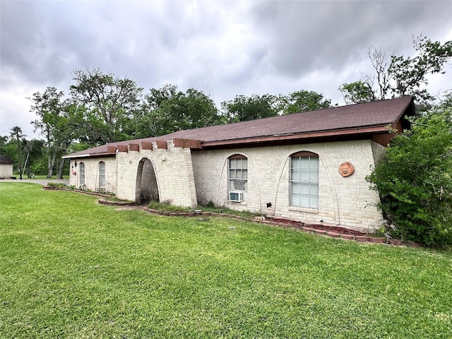 597 County Road 605, Angleton, TX 77515 - view of front of house with a front lawn