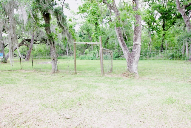 597 County Road 605, Angleton, TX 77515 - view of yard featuring fence