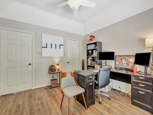 home office featuring ceiling fan, baseboards, and light wood-type flooring