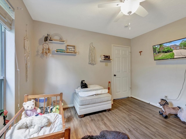 2806 Village Dl, Houston, TX 77059 - bedroom with wood finished floors, baseboards, and ceiling fan