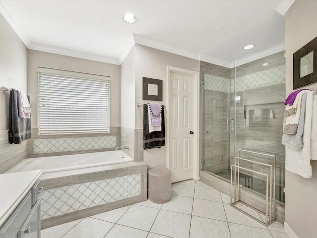 2806 Village Dl, Houston, TX 77059 - full bathroom featuring vanity, a garden tub, ornamental molding, a stall shower, and tile patterned floors