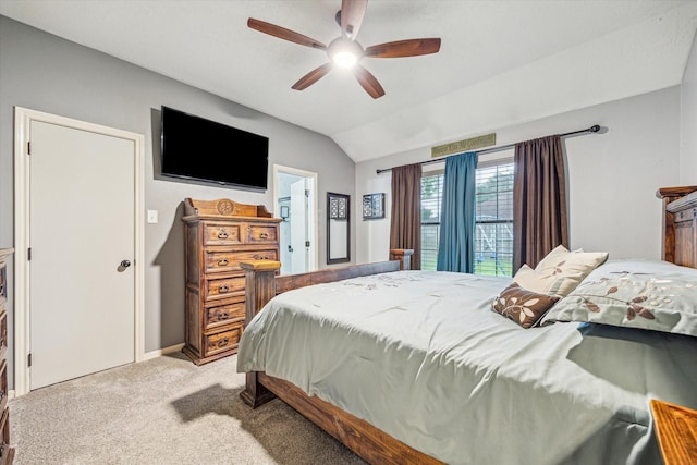 bedroom with baseboards, a ceiling fan, light colored carpet, and vaulted ceiling