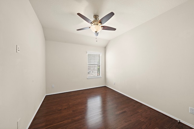 7234 Rambling Tree Ln, Richmond, TX 77407 - unfurnished room with baseboards, a ceiling fan, and dark wood-style floors