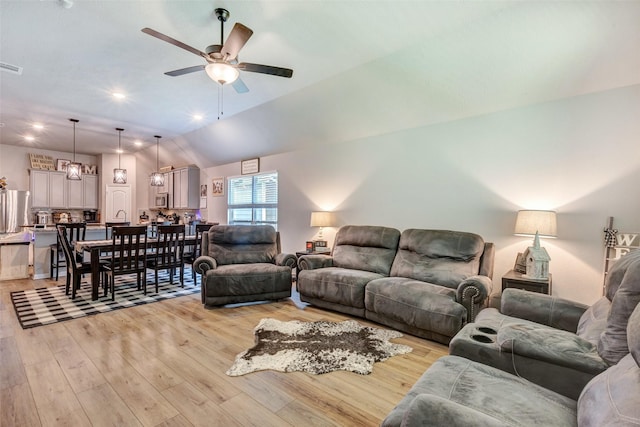 108 Alessandra Way, Huntsville, TX 77320 - living area featuring light wood-type flooring, a ceiling fan, visible vents, and lofted ceiling
