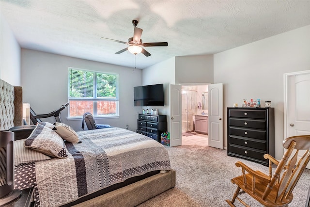 108 Alessandra Way, Huntsville, TX 77320 - bedroom with connected bathroom, ceiling fan, and carpet flooring