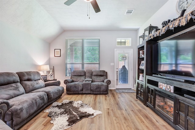 108 Alessandra Way, Huntsville, TX 77320 - living area featuring hardwood / wood-style flooring, lofted ceiling, a ceiling fan, and visible vents