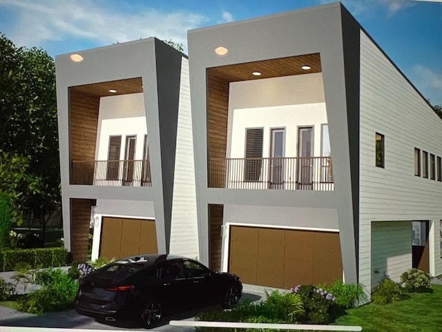 6405 Sidney St, Houston, TX 77021 - modern home featuring stucco siding and a garage