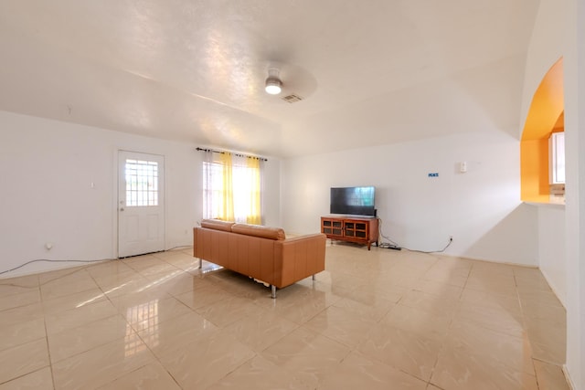 living room featuring visible vents