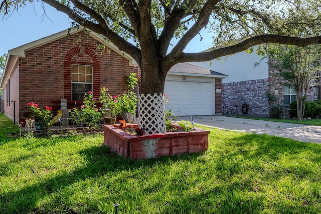 view of front of property with a garage, brick siding, a front yard, and concrete driveway