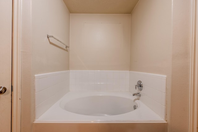 full bathroom featuring a bath
