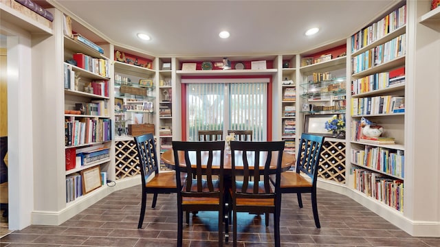 dining area featuring wood tiled floor