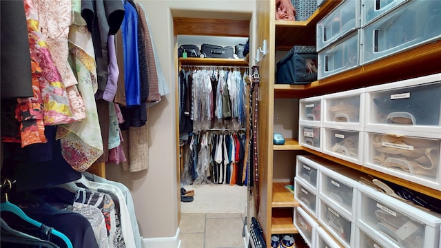 walk in closet featuring tile patterned floors