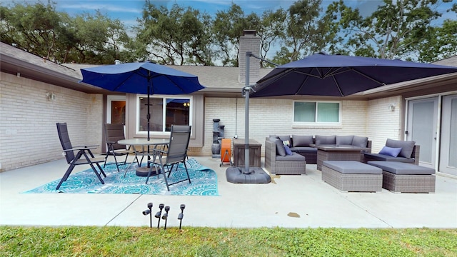 view of patio / terrace with an outdoor living space and outdoor dining area