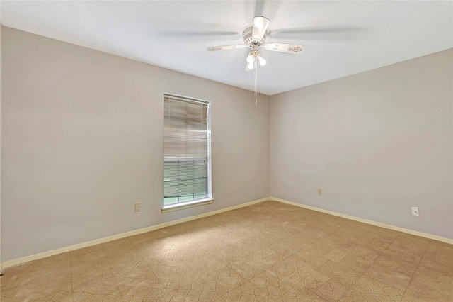 1419 Avenue Ave E, Danbury, TX 77534 - unfurnished room featuring ceiling fan and baseboards