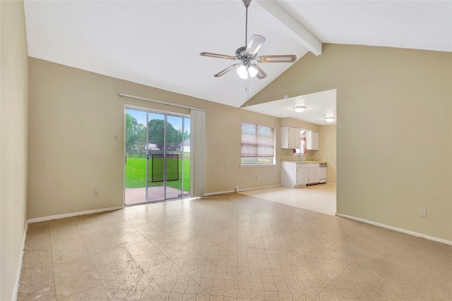1419 Avenue Ave E, Danbury, TX 77534 - interior space with baseboards, a ceiling fan, beam ceiling, and high vaulted ceiling