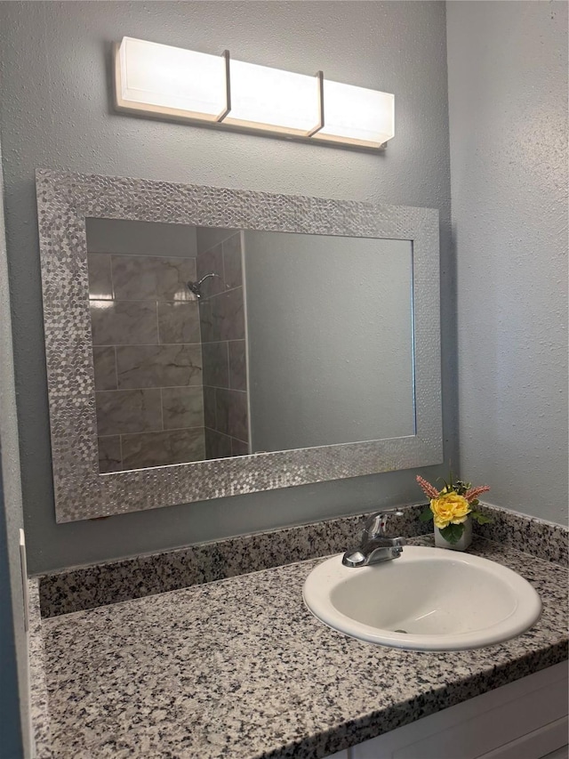 1419 Avenue Ave E, Danbury, TX 77534 - bathroom with vanity and tiled shower