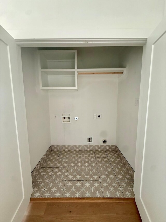 923 Fisher St Unit A, Houston, TX 77018 - laundry room featuring electric dryer hookup, washer hookup, gas dryer hookup, and wood finished floors