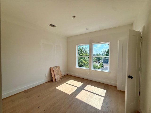 923 Fisher St Unit A, Houston, TX 77018 - unfurnished room with baseboards and wood finished floors