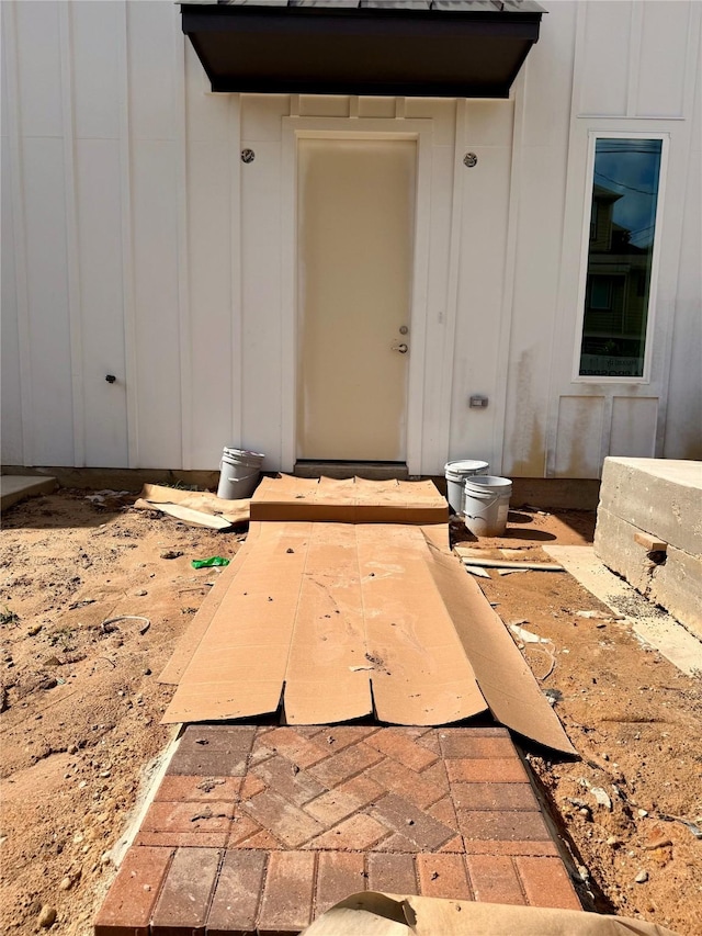 923 Fisher St Unit A, Houston, TX 77018 - doorway to property featuring board and batten siding