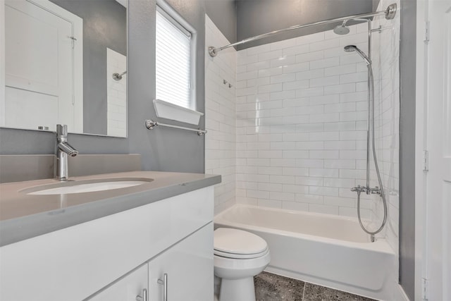 bathroom with toilet, tub / shower combination, and vanity