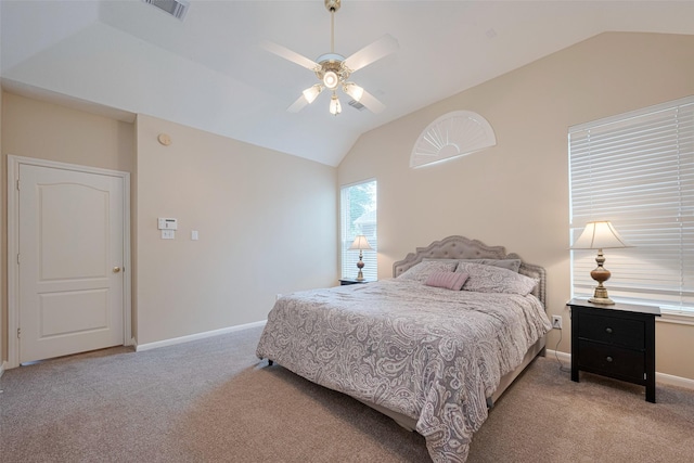 bedroom featuring baseboards, visible vents, vaulted ceiling, and light colored carpet