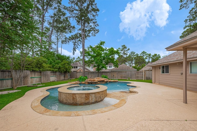 view of pool featuring a fenced backyard, a patio, and a pool with connected hot tub