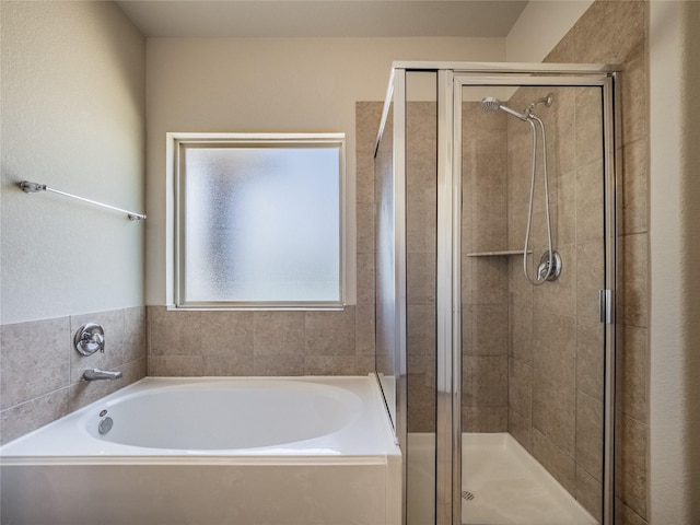 2560 Wild Oak Forest Ln, Seabrook, TX 77586 - full bathroom featuring a shower stall and a garden tub