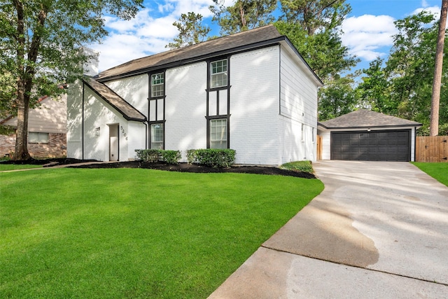 view of front facade featuring brick siding, a front lawn, and a garage