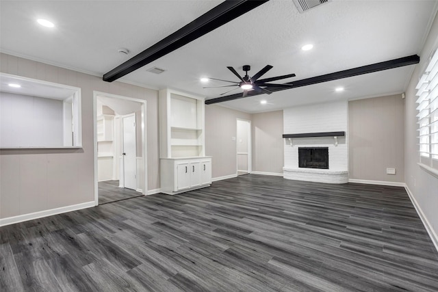 unfurnished living room featuring beamed ceiling, a ceiling fan, baseboards, and ornamental molding