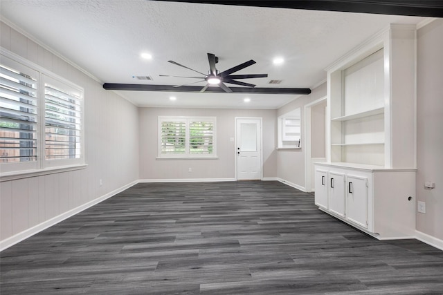 unfurnished living room featuring dark wood-style floors, ceiling fan, and crown molding
