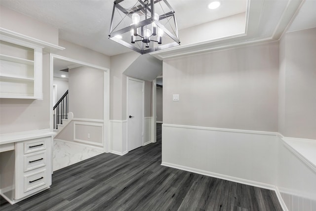 unfurnished dining area featuring stairway, a chandelier, dark wood-type flooring, visible vents, and recessed lighting