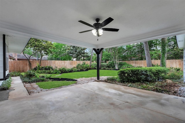 view of patio / terrace featuring a fenced backyard and a ceiling fan