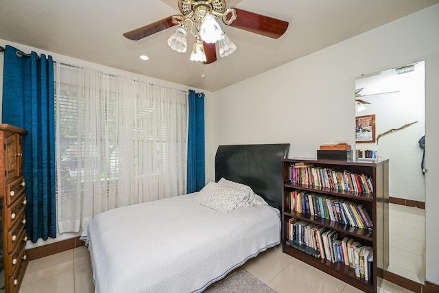 tiled bedroom featuring baseboards, recessed lighting, and ceiling fan