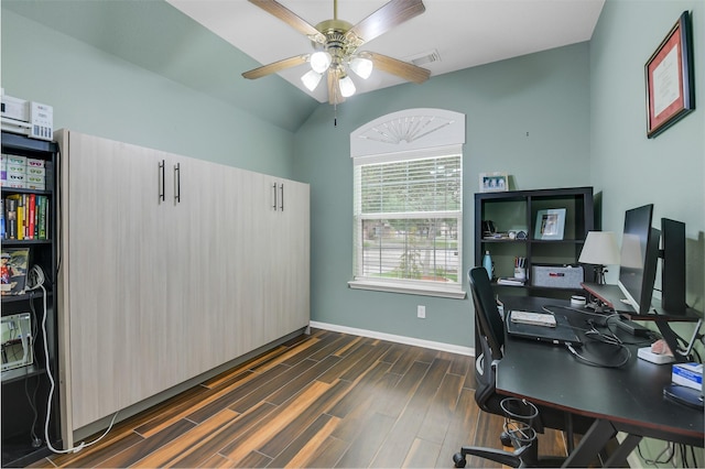 office area with lofted ceiling, wood finished floors, visible vents, baseboards, and ceiling fan