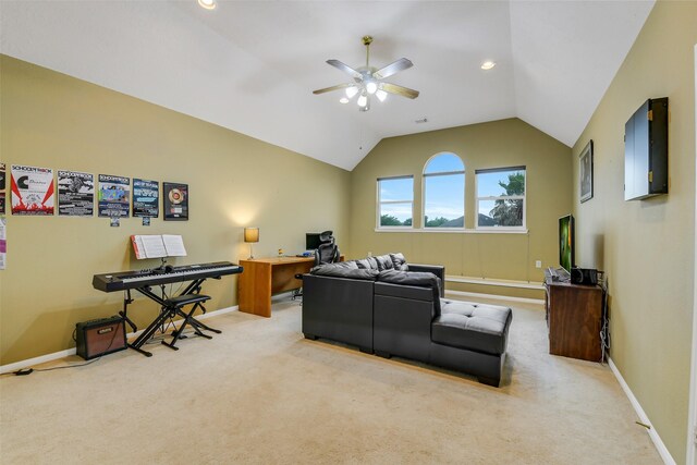 living area with carpet flooring, vaulted ceiling, baseboards, and ceiling fan