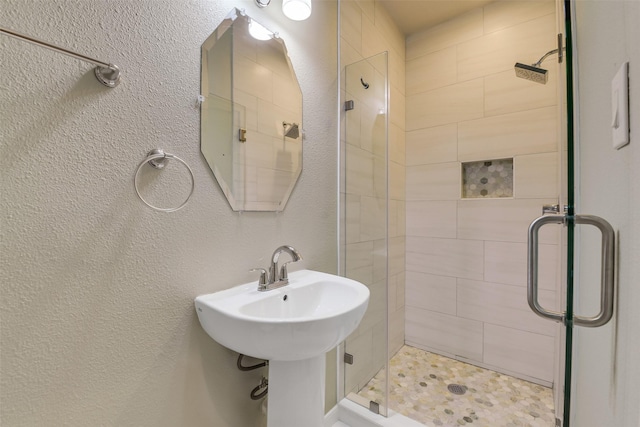 full bathroom with a shower stall