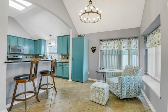 dining room featuring light tile patterned flooring, a chandelier, arched walkways, baseboards, and lofted ceiling