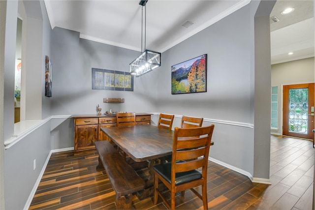 dining room featuring baseboards, visible vents, recessed lighting, wood finish floors, and ornamental molding