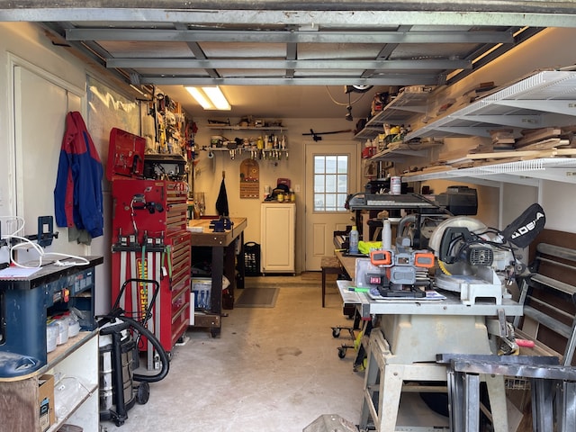 garage with a workshop area