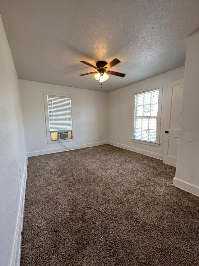 2711 Ruth St, Houston, TX 77004 - unfurnished room featuring baseboards, a ceiling fan, carpet flooring, and a textured ceiling