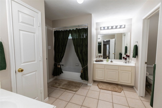 full bath with tile patterned floors, baseboards, vanity, toilet, and shower / tub combo with curtain