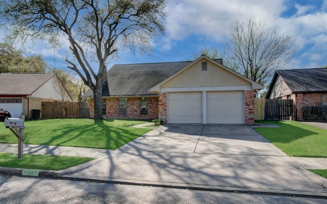 11307 Birdwing Ln, Houston, TX 77067 - single story home featuring brick siding, driveway, a front yard, and fence
