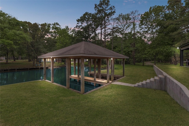 dock area featuring a gazebo and a yard