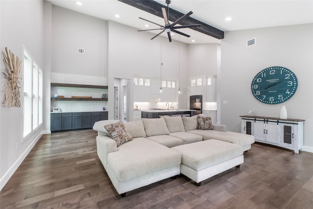 living area featuring recessed lighting, visible vents, high vaulted ceiling, and ceiling fan